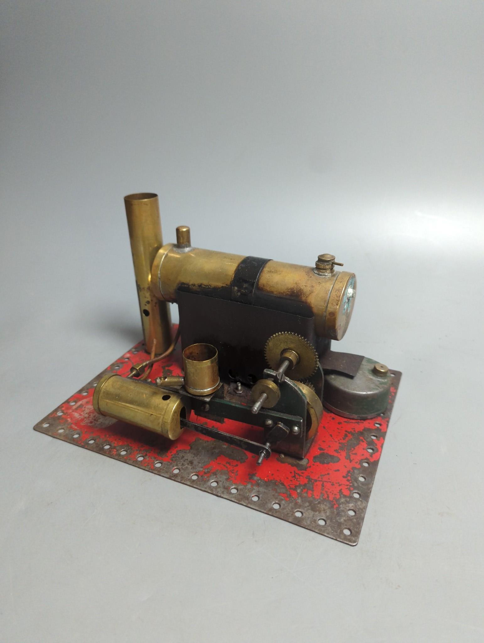 A Marklin spirit-fired live steam stationary engine with 10cm flywheel, 1920’s, and a smaller stationary engine